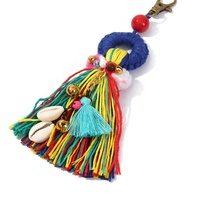 Pendentifs circulaires ethniques en coquillage contrastant avec pompons pour porte-clés, boucles d'oreilles et fermoirs de sac – En stock