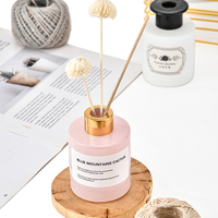 Diffuseur de parfum d'ambiance en verre rond vide de 150 ml et 200 ml avec bouchon à vis doré pour la décoration intérieure