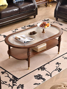 Mesa de Centro Ovalada Estilo Americano Vintage - Acabado en Nogal con Tapa de Vidrio Acanalado, Patas con Remaches Dorados, Estructura de Madera Sólida para Sala de Estar - Product Image 1