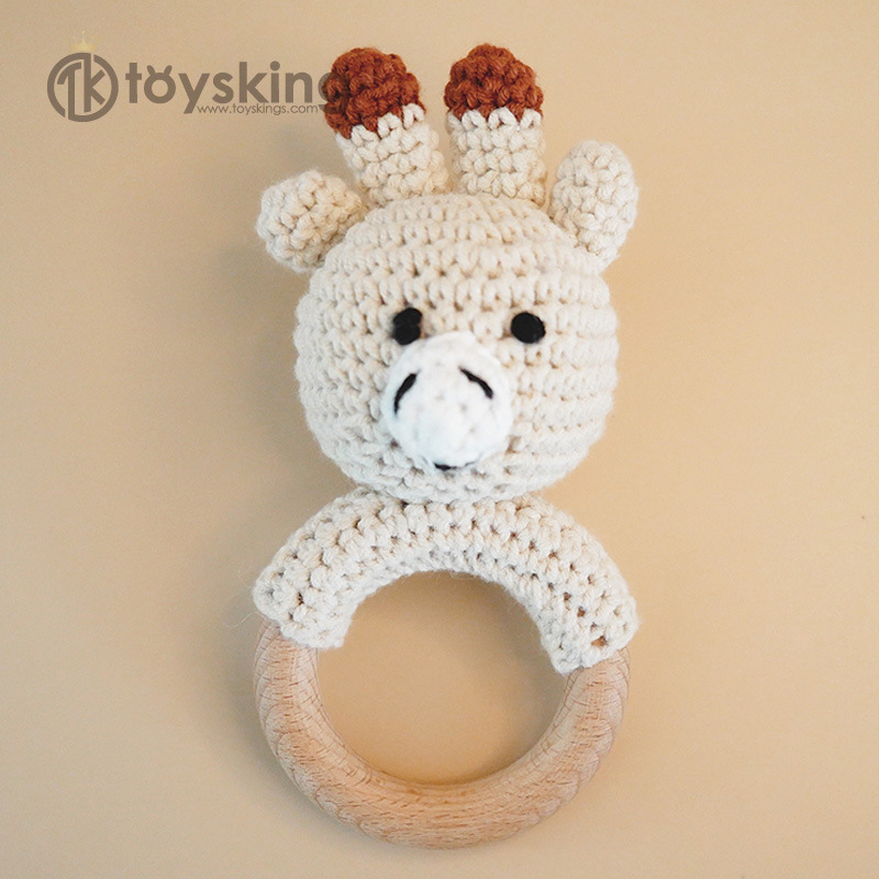 Campana de mano beige cervatillo