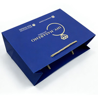 Sac cadeau en papier couché de luxe personnalisé, sac de shopping recyclable pour la vente au détail, emballage pour bijouterie de diamants, d'or et d'argent avec poignée