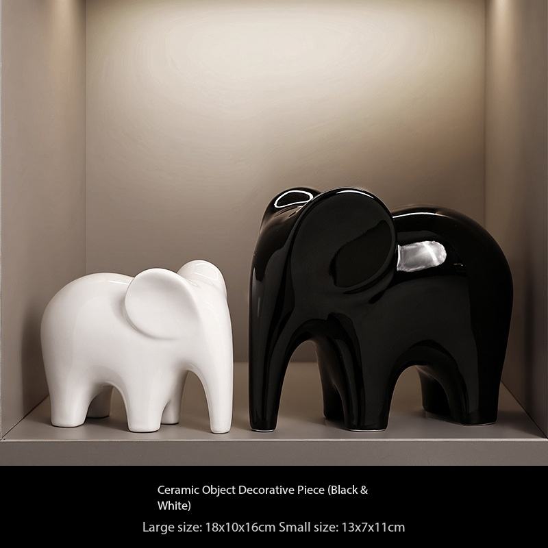 A pair of black and white ornaments