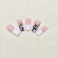 Bestseller transfrontalier : Autocollants pour ongles personnalisables, style français minimaliste blanc, motifs tête de mort et visage de fantôme d'Halloween, faux ongles.