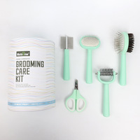 Logo personnalisé Accessoires pour animaux de compagnie Chat nettoyage brosse pour animaux de compagnie coupe-ongles Kit de cinq pièces chien épilateur brosse ensemble de toilettage