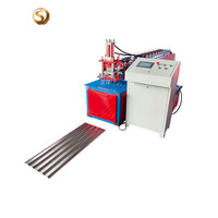 Machine de formage à froid pour volets roulants en acier 129-181