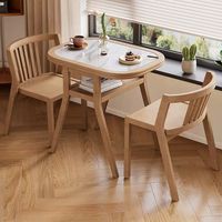 Ensemble table et chaises pliantes minimalistes en ardoise, résistant aux rayures et à la chaleur, idéal pour balcon et petits appartements