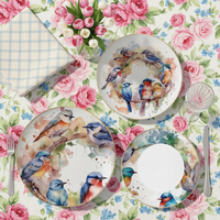 Service de table de luxe en céramique avec bordure dorée et motif oiseau aquarelle, comprenant assiettes en porcelaine fine et service à thé et café avec tasses et soucoupes