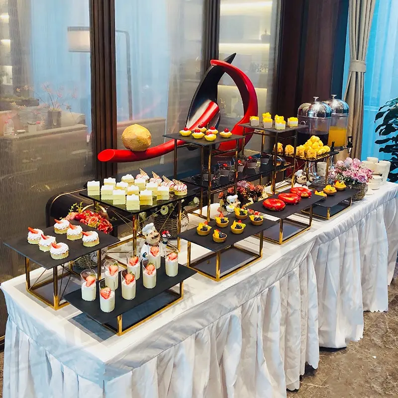 hotel restaurant wedding party buffet food display stand beautiful simple afternoon tea stand