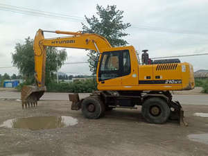 Excavatrice sur pneus originale d'occasion Hyundai Robex 210 de Corée, 21 tonnes, modèles R210W-7 et R210W-9, vente d'excavatrice 210W-9 bon marché - Product Image 6
