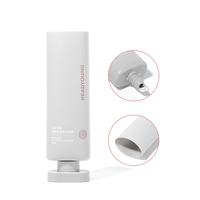 Tube cosmétique en PE gris clair mat de 100 ml avec bouchon à vis ovale plat, emballage élégant et féminin pour lotion corporelle