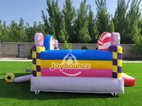 Structure gonflable personnalisée en forme de bonbon pour enfants, idéale pour les événements extérieurs, les parcs d'attractions et les locations commerciales.