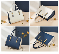 Bolso de mano de piel de vaca auténtica para mujer, bolsa de mano femenina de color contrastante, a la moda, precio al por mayor, 2022