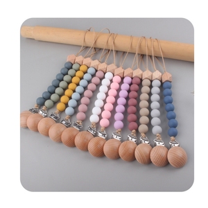 2025 Hot Safe Multi Style No tóxico Bpa Free Pink Blue Baby Dummy Holder Mordedor Silicona Haya Madera <span class=keywords><strong>Chupete</strong></span> <span class=keywords><strong>de</strong></span> madera Cadena <span class=keywords><strong>de</strong></span> clip - Product Image 1