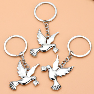 Người bạn món quà Hòa Bình chim bồ câu Keychain động vật chim Keychain kim loại móc chìa khóa xe Túi Chìa khóa mặt dây chuyền hình chim bồ câu Keychain Hòa Bình vòng chìa khóa - Product Image 2