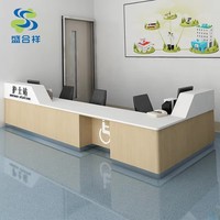 Comptoir d'accueil et zone d'allaitement en métal, vert, style moderne, durable, pour centre de santé, hôtel et centre commercial
