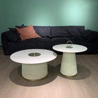 Ensemble de table basse nordique moderne avec plateau en pierre frittée, finition en cuir synthétique et base en métal pour la maison