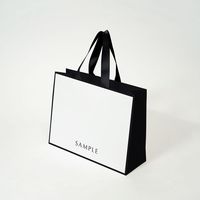 Bolsa de Regalo de Papel Blanco con Logotipo Personalizado, Borde Marrón y Asa de Cinta Azul Marino, Bolsas de Compras de Cartón al por Mayor