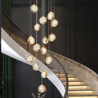 Lustre en verre LED moderne de luxe nordique Double escalier saut de sol bulle de cristal pour hôtel Villa éclairage d'escalier rotatif