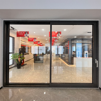 Porte coulissante en verre à cadre en aluminium à rupture de pont thermique, design résistant au vent et aux intempéries pour application extérieure de maison moderne