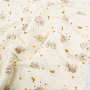 Tela de muselina con estampado de diseño de dibujos animados personalizado 100% ropa de bebé orgánica 100% tela de gasa de doble capa de algodón para bebé - Product Image 5