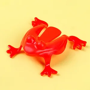 Promoción Mini juguetes de plástico colorido saltando Rana dedo presionando juguetes para niños divertido juego transparente ranas que rebotan