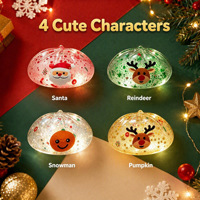 Ensemble de jouets anti-stress lumineux en forme de boulette de Noël en TPR avec paillettes, 4 designs festifs, coffret cadeau, vente en gros, personnalisable OEM ODM