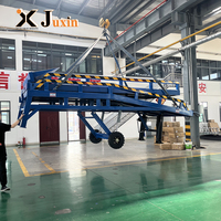 Rampe de quai hydraulique mobile CE pour usine, plateforme de chargement robuste, équipement de manutention de marchandises pour chariots élévateurs et logistique d'entrepôt