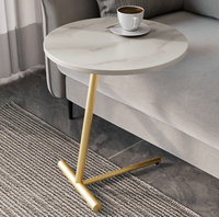 Table basse très vendue, table d'appoint haut de gamme et luxueuse, fabriquée avec des pieds en métal et un plateau en pierre frittée