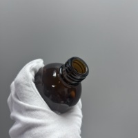 Flacon en verre ambré pour sirop contre la toux avec bouchon à vis et design sérigraphié pour le stockage de médicaments et de lotions