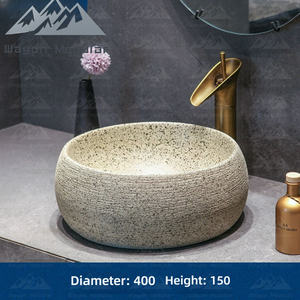 Lavabo rond sur plan en céramique texturée motif pierre Wayon pour projet hôtelier de luxe - Product Image 4