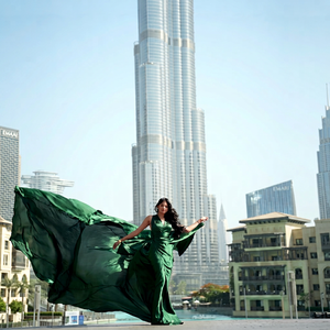 Elegant <b>Emerald</b> Green Long Flying <b>Dress</b> Outdoor Photo Shoot Wear Dubai Flying <b>Dress</b> Luxury Satin Maxi Gown - Product Image 1