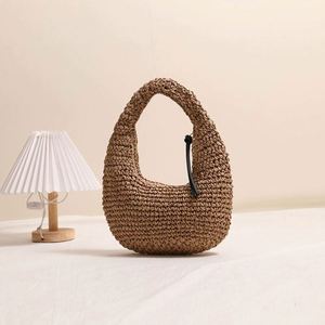Sac à main en paille tressée pour femme, nouveau style, couleur unie, avec pompon, idéal pour les vacances à la plage et les loisirs en bord de mer - Product Image 3