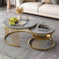 Table basse de style nordique avec plateau en dalle de roche luxueuse et structure en acier inoxydable, idéale pour salon moderne ou petit appartement