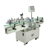 Machine d'étiquetage automatique pour bouteilles rondes, flacons, boîtes de conserve et pots, avec application d'étiquettes sur un ou deux côtés en plastique ou verre