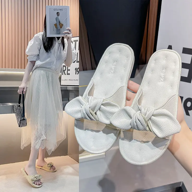 Sandali e pantofole le donne indossano fondo piatto 2022 estate nuova moda Casual testa tonda fiocco spiaggia una parola pantofole da donna