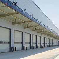 Porte à enroulement électrique intelligente en alliage d'aluminium, nouvelle, automatique, coupe-vent, à faible consommation d'énergie, pour usage industriel extérieur, vente en gros