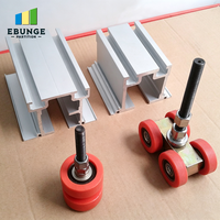 Système de rail et de chariots à roulettes en aluminium pour cloison mobile