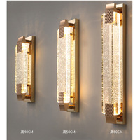 Applique murale moderne de luxe pour chambre d'hôtel Applique murale contemporaine à LED en cristal et métal