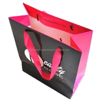 Sacs en papier personnalisés de luxe roses pour cosmétiques et vêtements – Sacs shopping en papier sur mesure