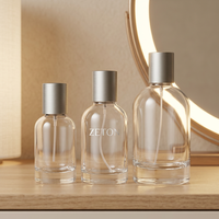 Flacon de parfum cylindrique en verre borosilicate transparent vide de 30 ml, 50 ml, 100 ml, rechargeable, avec atomiseur et bouchon, impression de logo personnalisée