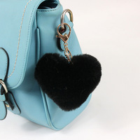 Vente en gros chaude 10cm pelucheux léopard boule de fourrure en peluche Pom Pom porte-clés voiture fleur fausse fourrure dessin animé sac pendentif coeur pompon porte-clés