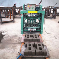 Machine semi-automatique de fabrication de pavés creux en béton Machine à mouler Prix Machine manuelle de fabrication de briques de ciment pour la ponte des œufs