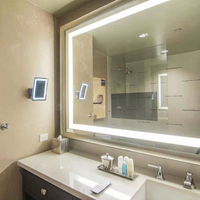 Miroir de salle de bain moderne sans cadre avec éclairage frontal LED Smart TV 3000-6000K, interrupteur tactile, indice de protection IP44, haut de gamme pour hôtel