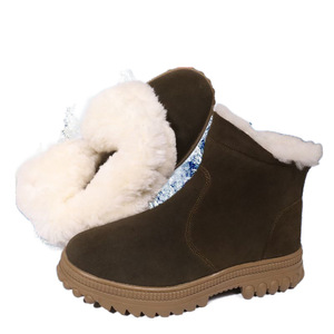 Bottes de neige pour hommes à talon moyen, doublées de laine épaisse et chaude, antidérapantes, en cuir durable, pour l'extérieur, couleur unie - Product Image 1