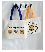 Sac à main mini en toile motif visage souriant pour l'été 2026 – Sac fourre-tout décontracté et tendance pour femme, petit sac à main en toile pour usage quotidien