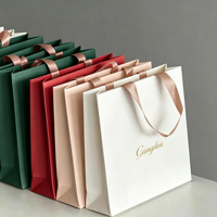 Sac en carton recyclable haute résistance avec logo personnalisé, texture luxe léger, capacité maximale 6-9 kg, pour vêtements, vente en gros, exposition, avec poignée