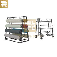 Présentoir sur mesure double face pour rouleaux de tissu, tapis, nappes et cuir, avec roulettes