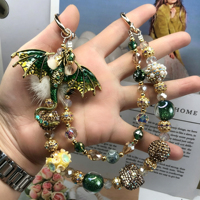 Breloque de sac Dragon Fantastique perlée, Dragon à ailes en strass de cristal, Cordon de téléphone, Porte-clés à double rang de perles avec fermoir mousqueton