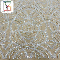 Tissu en dentelle de tulle perlé de luxe à la mode, tissu en maille de perles écologique, tissu brodé de paillettes pour robes de mariée
