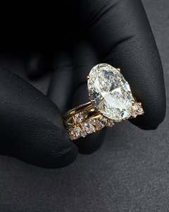 แหวนหมั้นเพชรทรงรีเพาะเลี้ยงในห้องปฏิบัติการทองคำแท้ 18K สำหรับผู้หญิง ประดับเพชรทรงบริลเลียนต์ด้านข้าง ได้รับการรับรองจาก IGI ชุบโรเดียม - Product Image 1